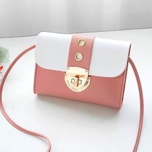 Mini pink crossbody faux leather purse